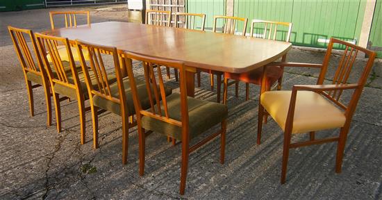 Gordon Russell, extending teak dining table with ten chairs including two carvers W.230cm